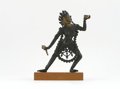 Appraisal: A Nepalese bronze figure of Vajra Dakini dancing and wearing