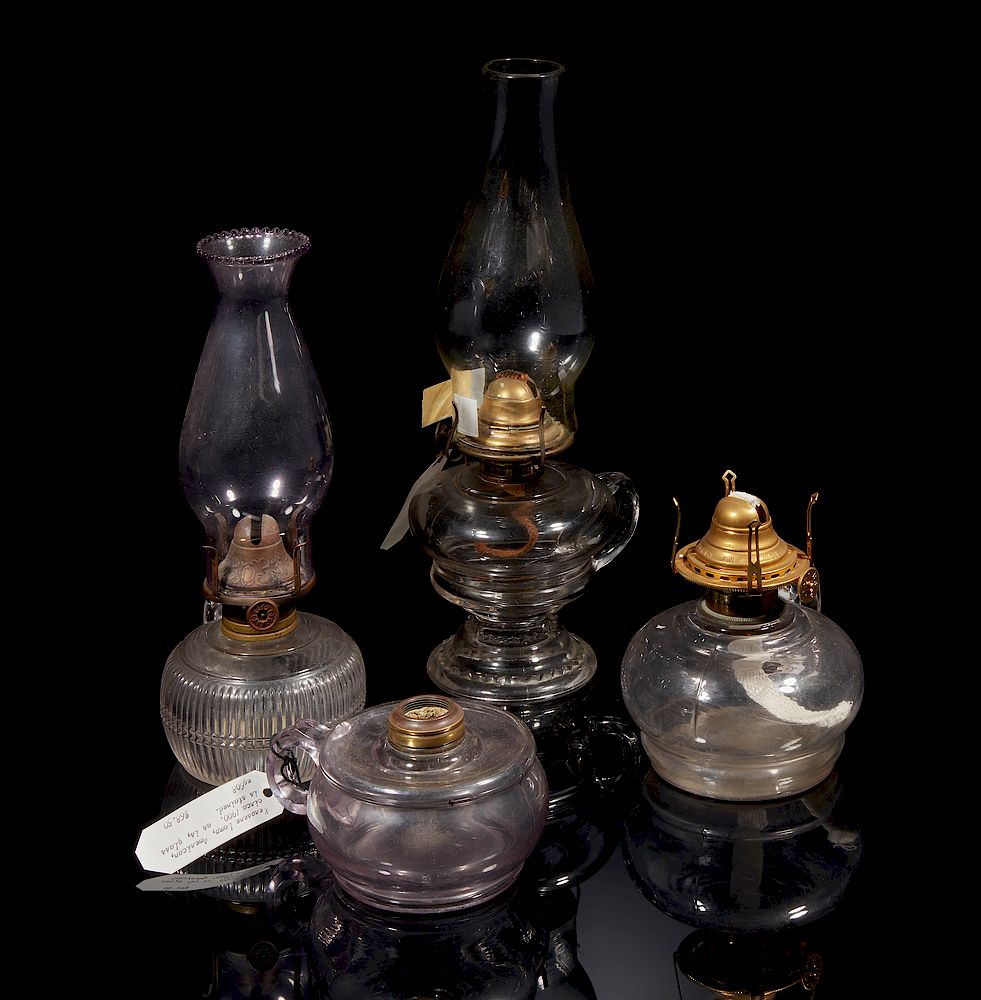 Appraisal: Four Glass Kerosene Lamps Four glass handled kerosene lamps two