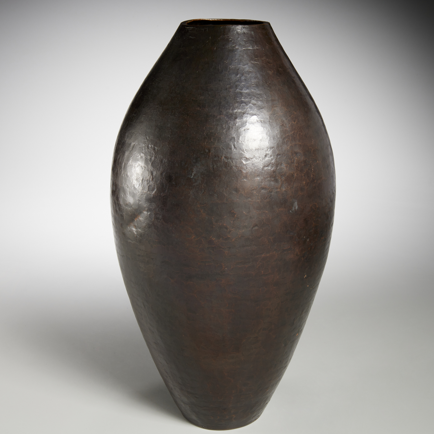 Appraisal: ROBERT KUO LARGE HAMMERED COPPER VASE th c dark patinated