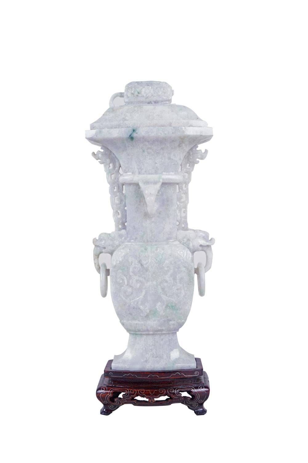 Appraisal: CARVED JADEITE VASE COVERwith stand vase and cover inches high