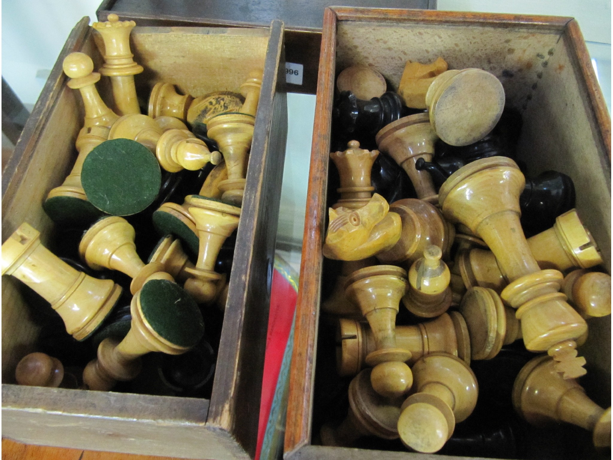 Appraisal: A lot comprising two sets of chessmen and a set