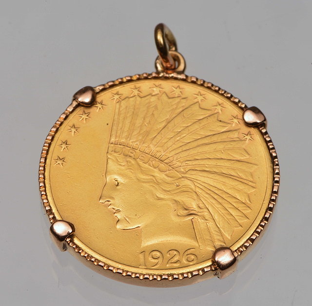 Appraisal: A GOLD PENDANT set with a United States gold Ten