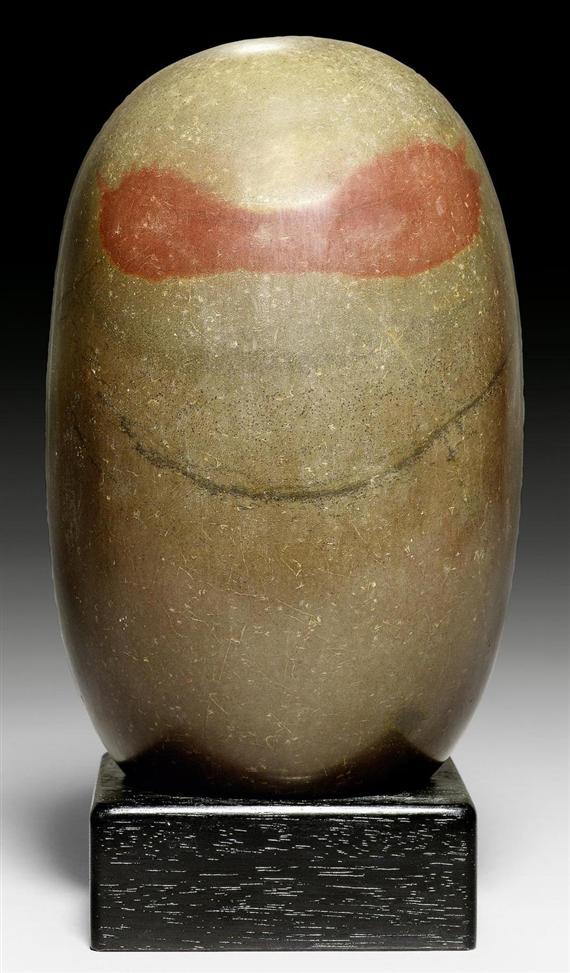 Appraisal: AN OVOID STONE LINGAM WITH RED YONI PATTERN India height