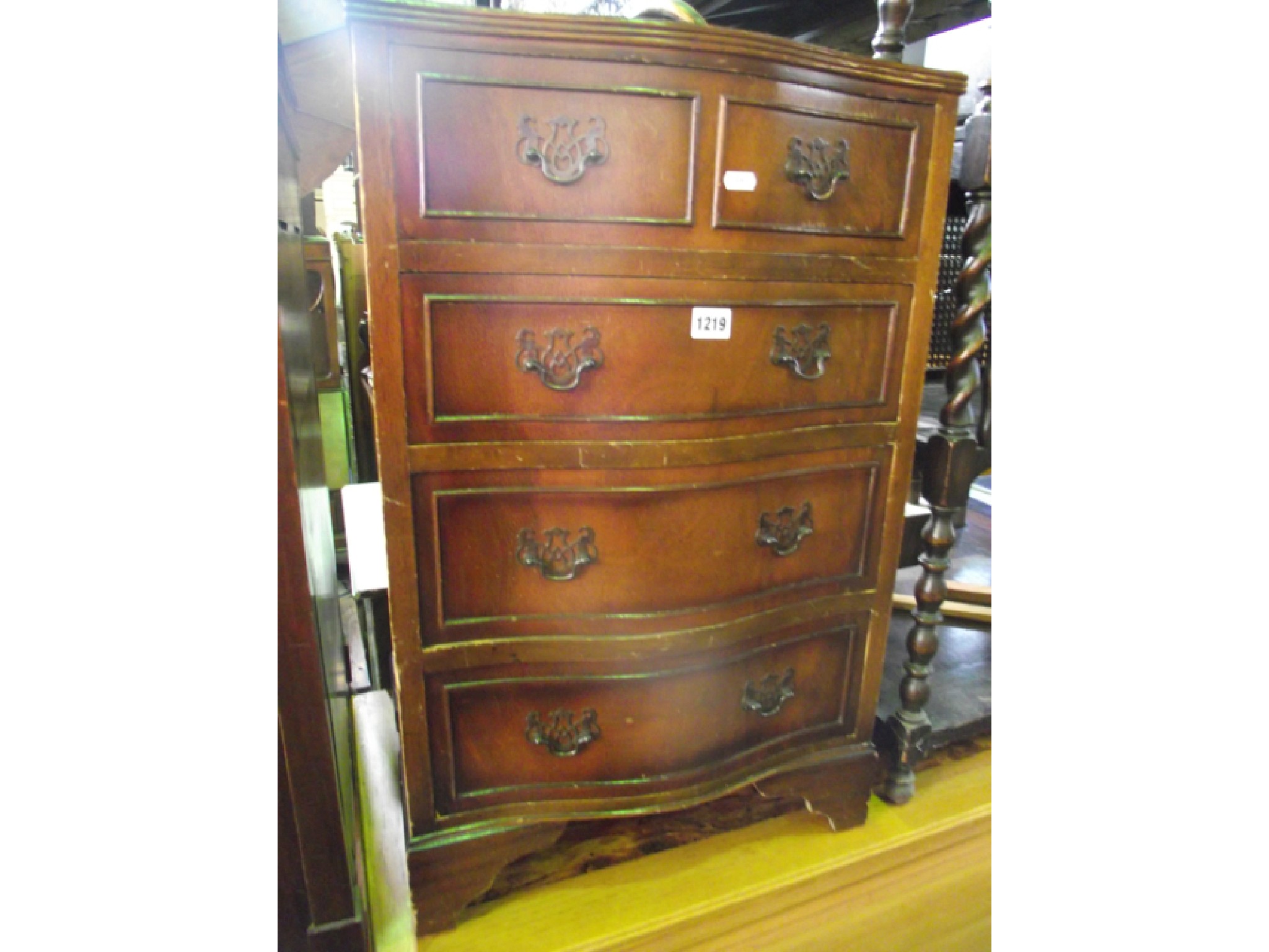 Appraisal: A small reproduction Georgian style serpentine chest of four long