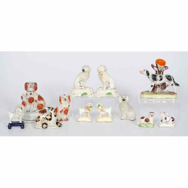 Appraisal: Staffordshire Spaniels England an assembled group of Staffordshire spaniels including