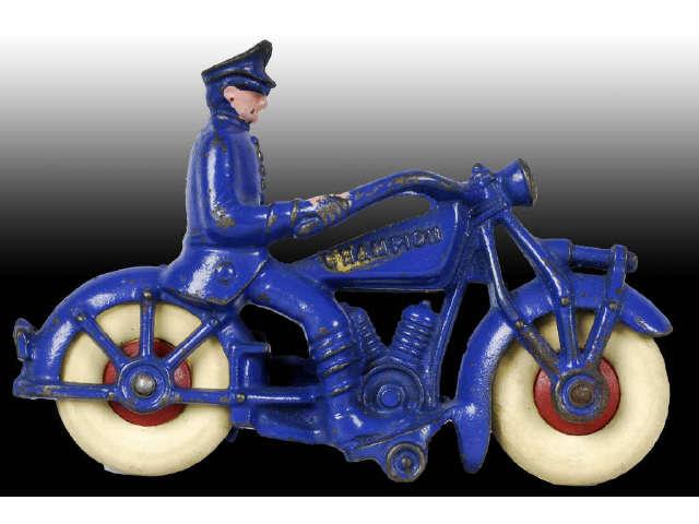 Appraisal: Cast Iron Champion Policeman Motorcycle Toy Description White rubber tires