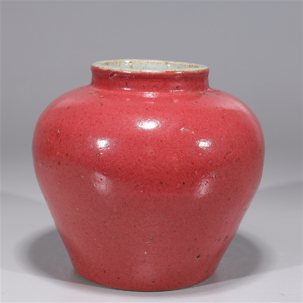 Appraisal: Chinese ceramic red glazed vase with designs to interior overall