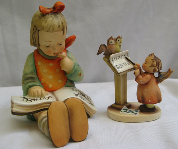 Appraisal: TWO GERMAN HUMMEL FIGURES The first Book Worm girl HUM