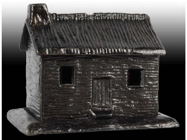 Appraisal: Cast Iron Log Cabin Still Bank Description Made in US