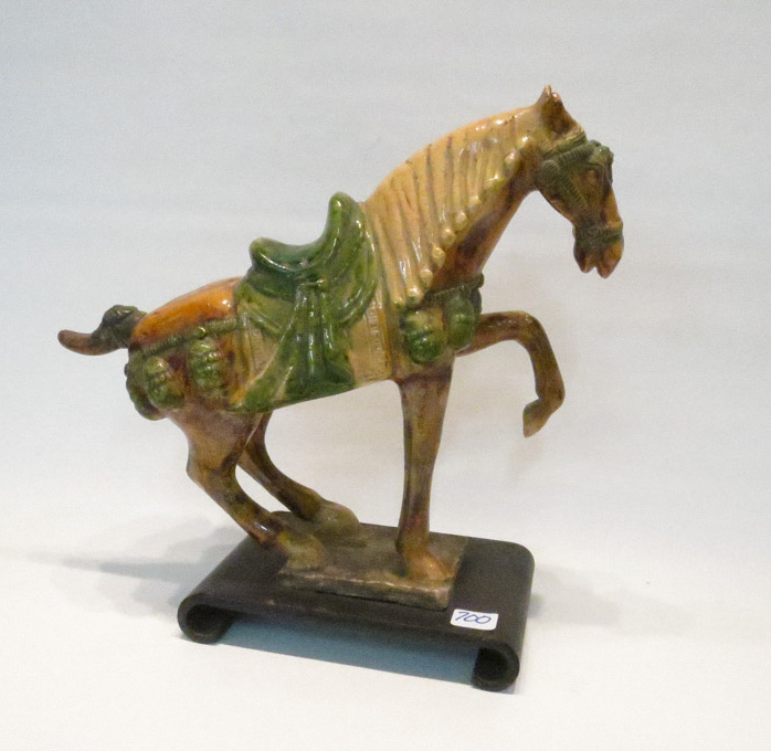 Appraisal: CHINESE GLAZED POTTERY HORSE Chinese Tang Dynasty style green orange