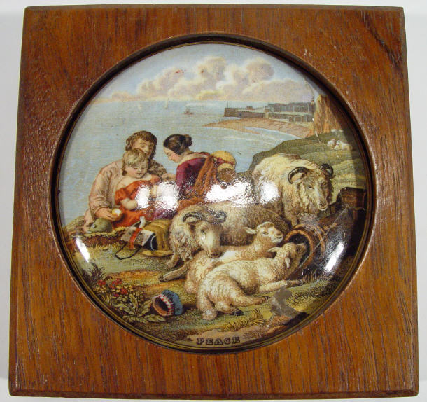 Appraisal: Victorian Prattware pot lid - Peace in an oak surround