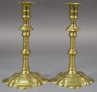 Appraisal: Pair of George III brass candlesticks having turned shaft on