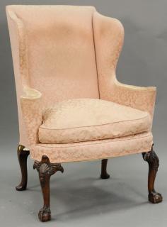 Appraisal: Mahogany Chippendale style upholstered wing chair with bird's heads on