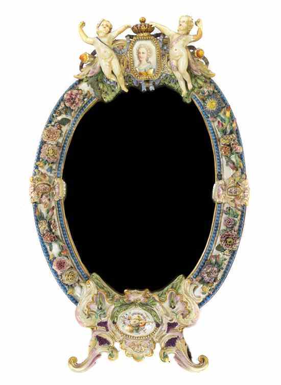 Appraisal: A Meissen Porcelain Mirror having a shaped oval beveled plate