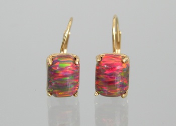 Appraisal: A Pair of Opal Lever-Back Earrings k yellow gold lever-back