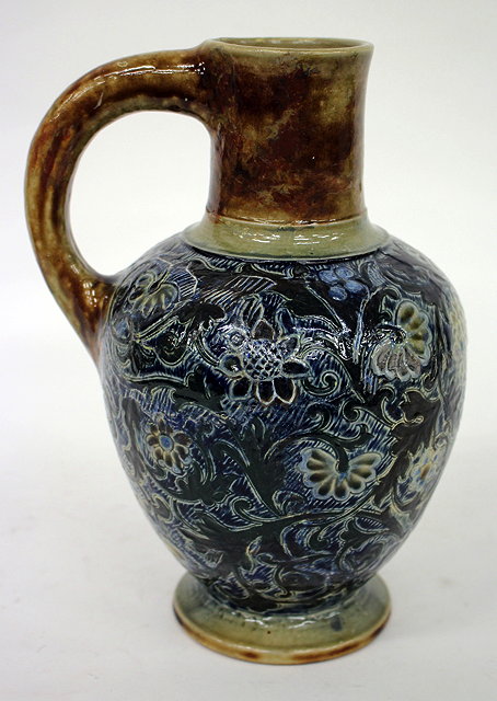 Appraisal: A VICTORIAN MARTIN WARE BOTTLE JUG with narrow neck looping