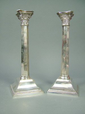 Appraisal: A pair of silver table candlesticks with corinthean capitals octagonal