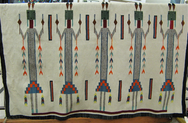 Appraisal: PICTORIAL NAVAJO CEREMONIAL WALL RUG the ivory field featuring five