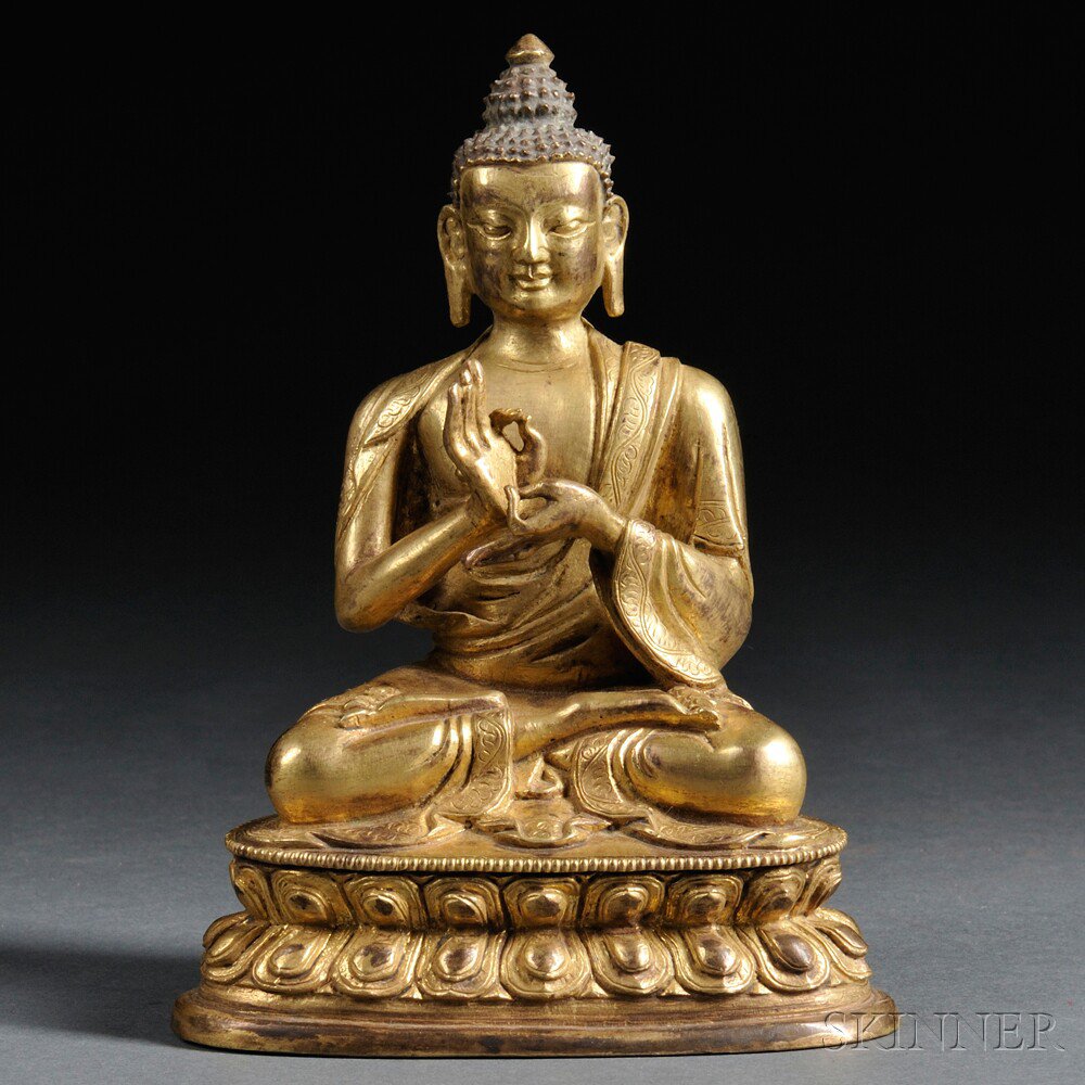 Appraisal: Gilt-bronze Buddha Sino-Tibet the figure modeled seated in dhyanasana on