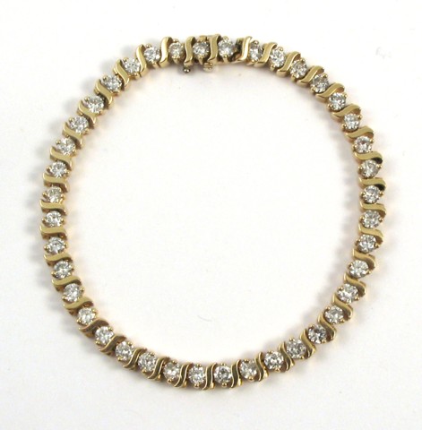 Appraisal: DIAMOND AND FOURTEEN KARAT GOLD BRACELET - in length and