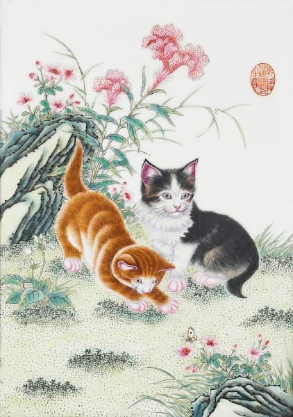 Appraisal: A pair of wood-framed porcelain wall plaques depicting kittens th