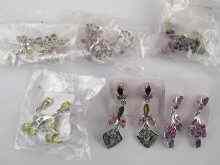 Appraisal: A quantity of white metal tests silver gem set jewellery