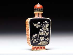 Appraisal: LACQUERED IVORY SNUFF BOTTLE Chinese carved and lacquered ivory rectangular