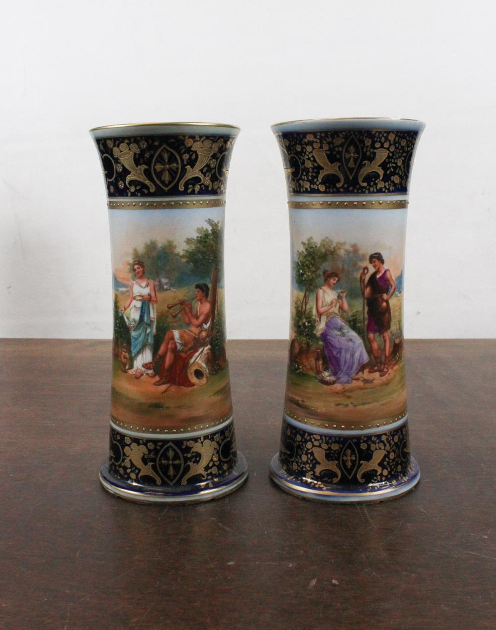 Appraisal: PAIR OF ROYAL VIENNA STYLE PORCELAIN VASES with slightly tapered