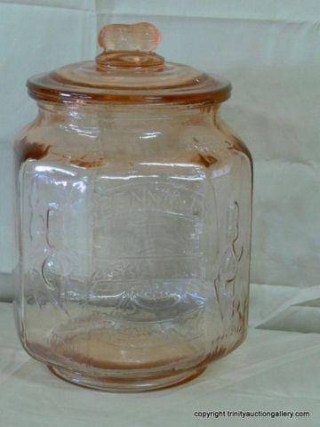 Appraisal: Large Planters Peanuts Pink Glass Cookie Jar or fill full