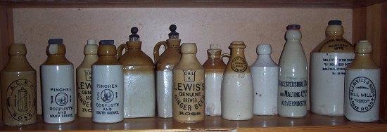 Appraisal: Sundry stoneware bottles including ginger beer and named examples