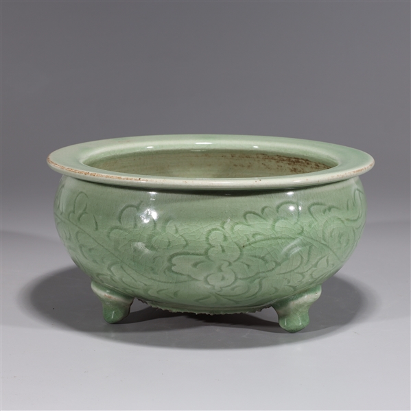 Appraisal: Chinese celadon glazed tripod censer with incised floral designs H