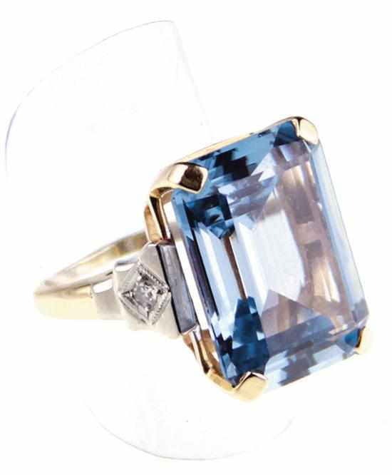 Appraisal: Topaz and diamond cocktail ring x x mm blue topaz