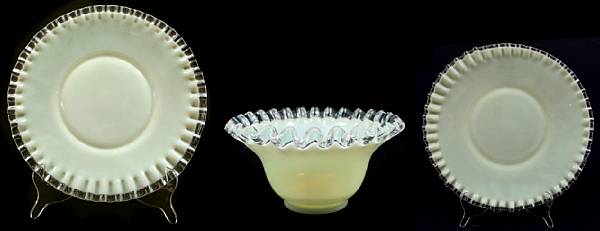 Appraisal: A suite of vaseline and clear glass tableware with crimped