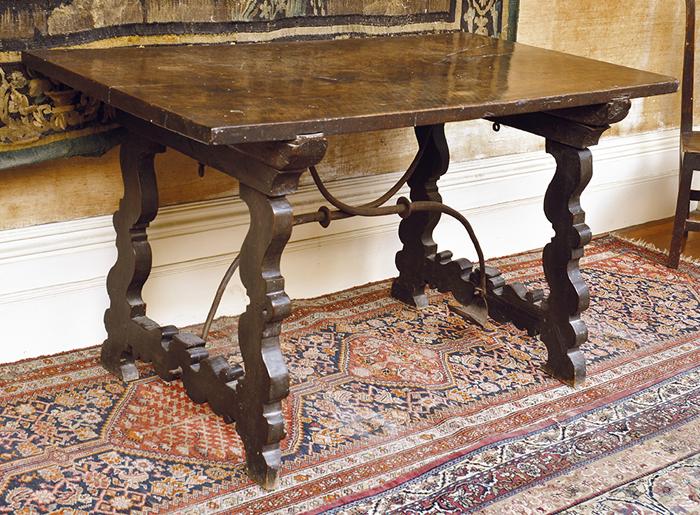 Appraisal: A CARLOS II SPANISH WALNUT SIDE TABLE WITH AN IRON