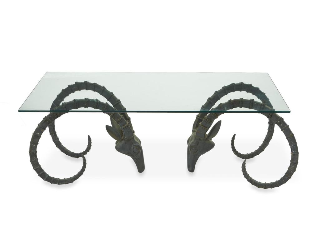 Appraisal: A bronze ibex head coffee table attributed to Alain Chervet