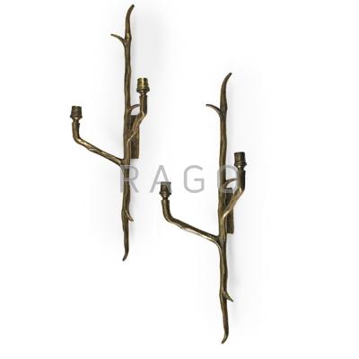 Appraisal: FELIX AGOSTINI - Pair of sconces France s Bronze two