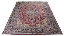 Appraisal: Isfahan Carpet Characteristic Isfahan arabesques medallion with palmette flower sprays