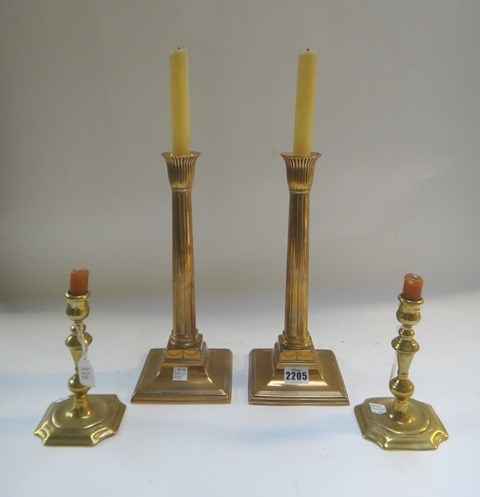 Appraisal: A pair of Adams style brass candlesticks of Corinthian column