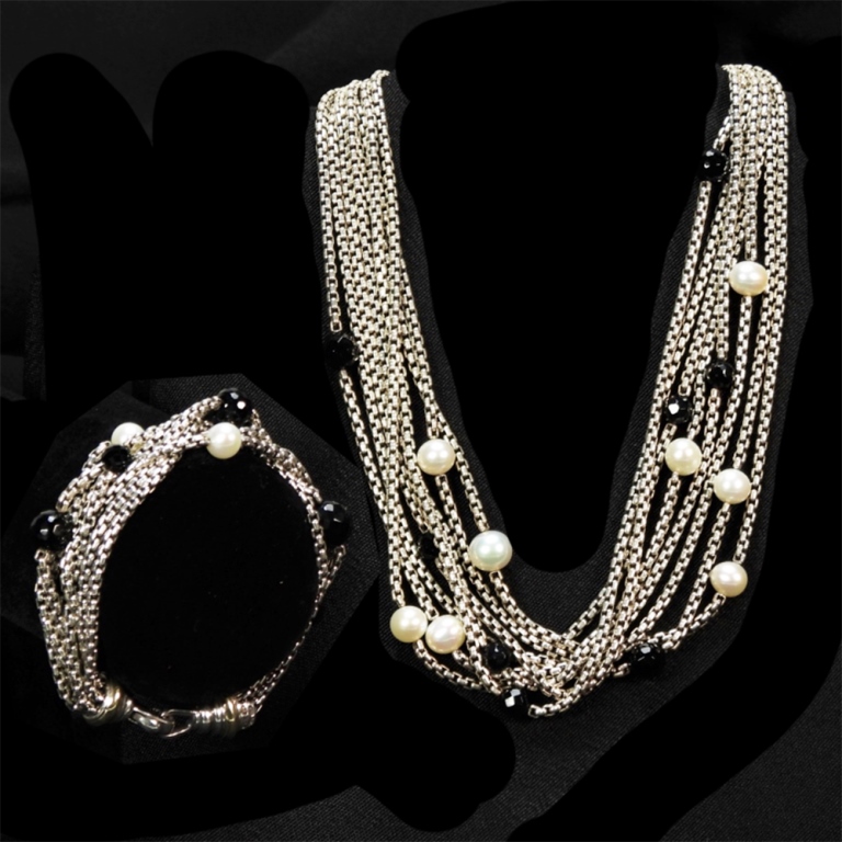 Appraisal: PC DAVID YURMAN STERLING SILVER ONYX PEARL SET Eight strand