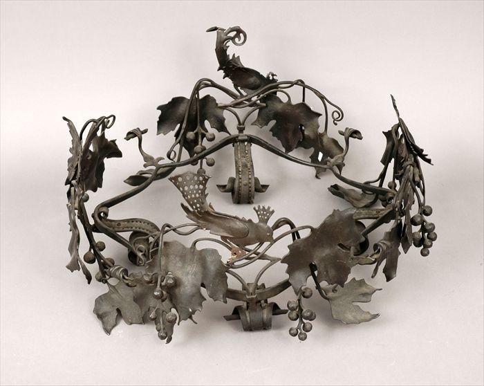 Appraisal: Wrought-Iron Ring-Form Ornament with Vine Leaves Berries and Birds in