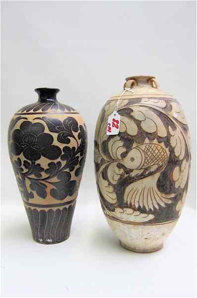 Appraisal: TWO CHINESE POTTERY VASES the first incised with stylized carp