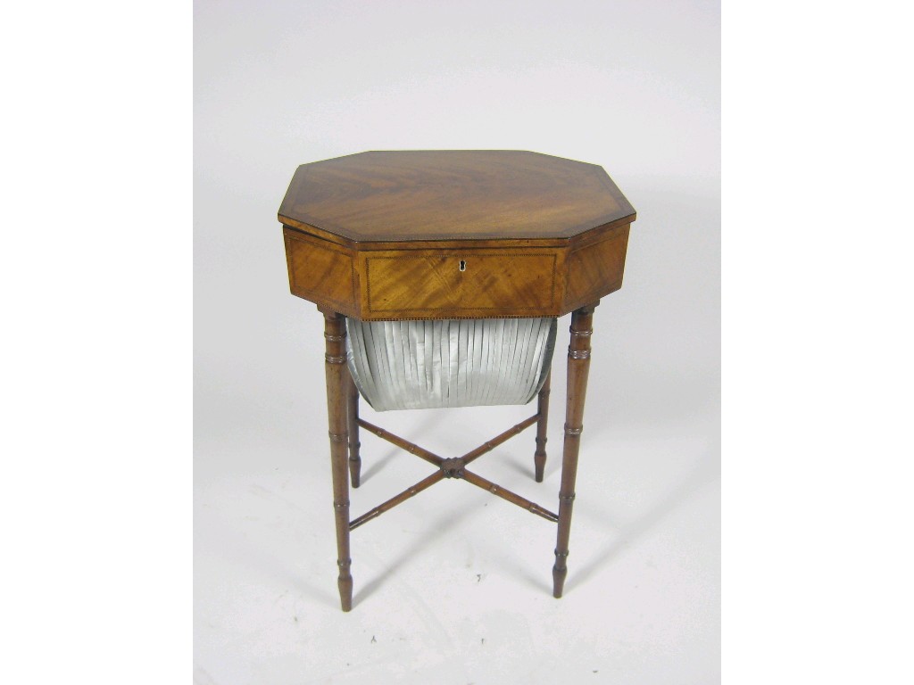 Appraisal: A Regency mahogany Work Table having chequered stringing with octagonal