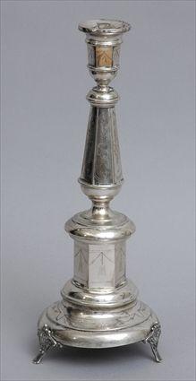 Appraisal: AUSTRIAN ENGRAVED SILVER TALL CANDLESTICK The flared hexagonal stem with