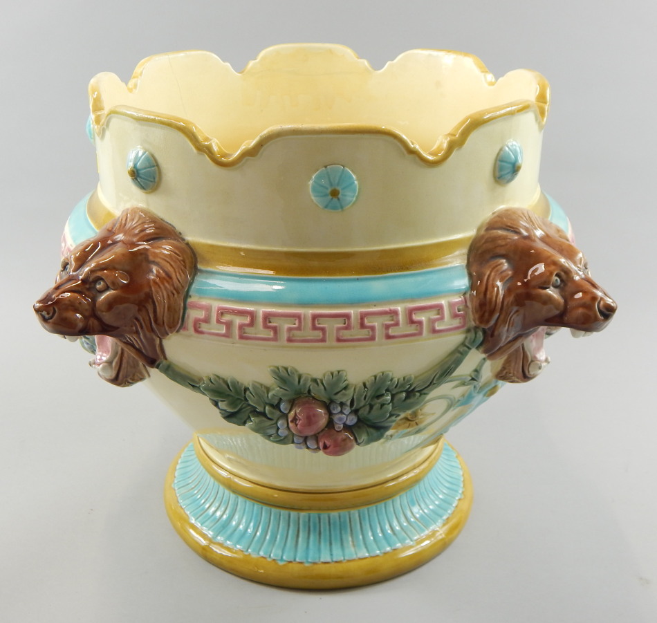 Appraisal: A Wedgwood majolica jardiniere decorated with swags of fruit and