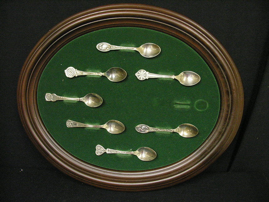 Appraisal: SEVEN STERLING SPOONS WITH HOLDER Each weights Troy oz Rack