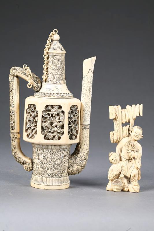 Appraisal: TWO IVORY CARVINGS China th century Two children one with