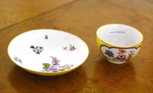 Appraisal: CUP AND SAUCER WITH YELLOW GROUND Meissen circa With bouquet