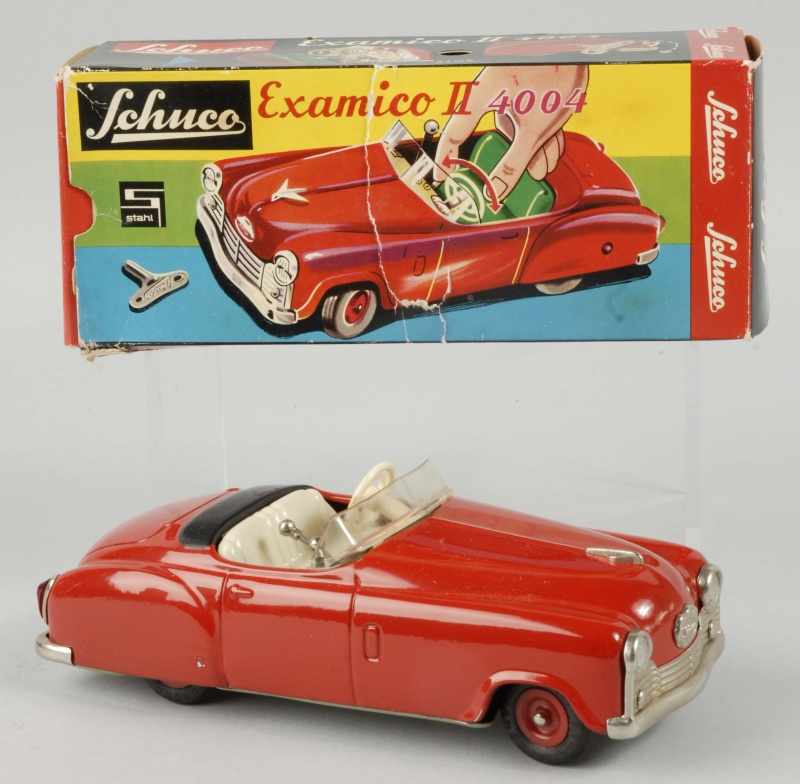 Appraisal: Tin Schuco Examico II Car Wind-Up Toy Description German Car