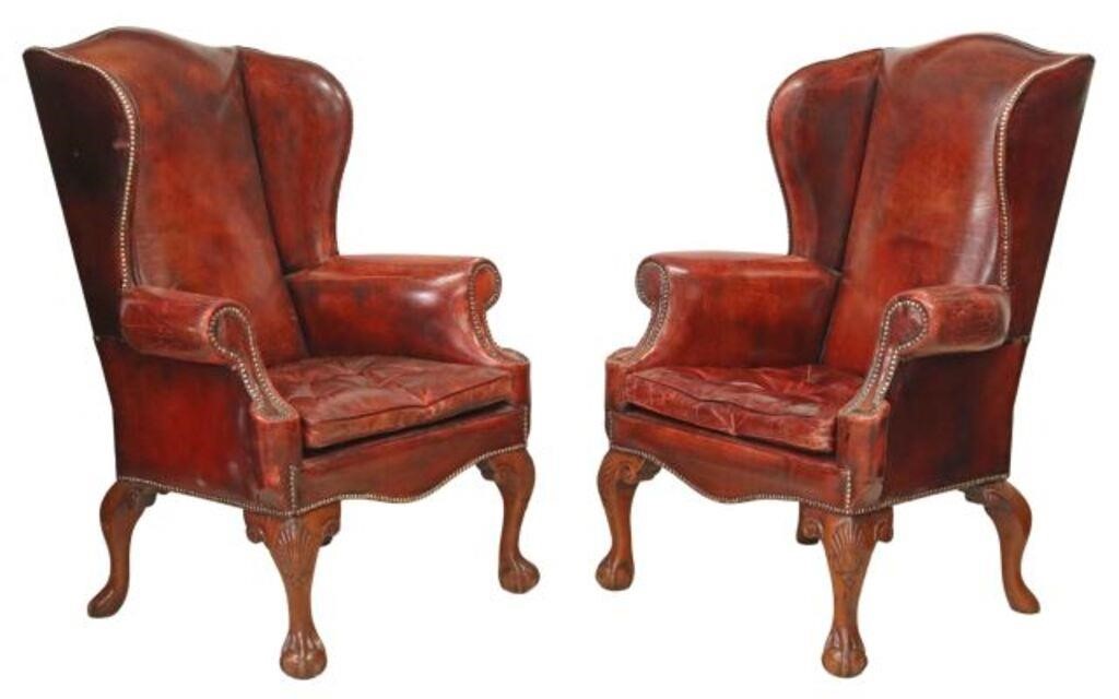 Appraisal: pair Chippendale style wingback armchairs th c in worn oxblood