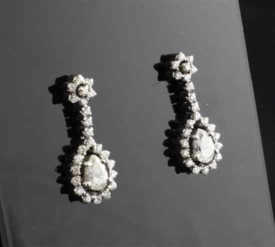 Appraisal: A pair of ct white gold set diamond drop earrings